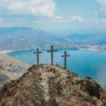 3 wooden cross on top of the mountain