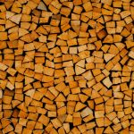 a close up of a pile of wood
